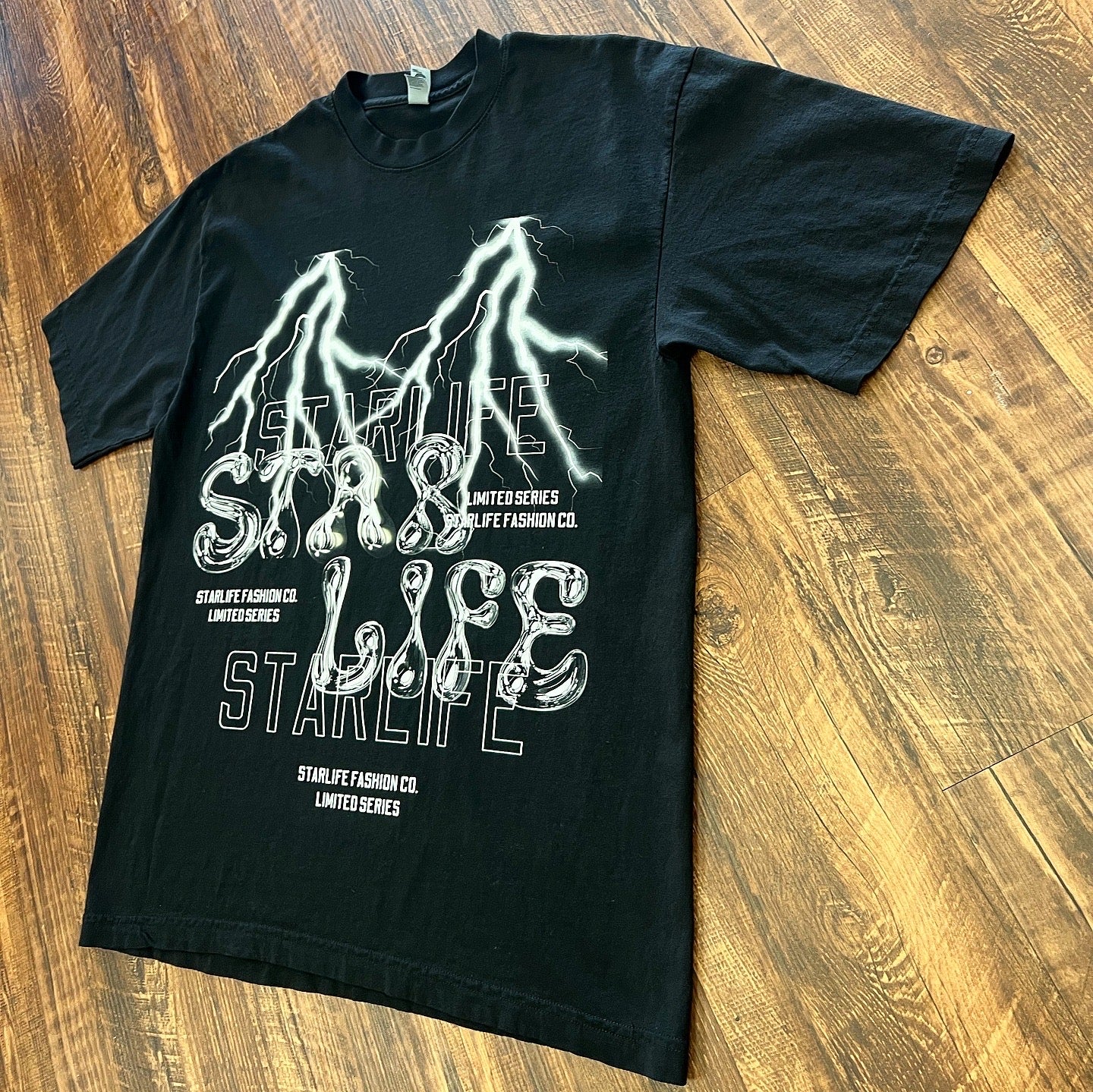 Shock The World Graphic T-Shirt